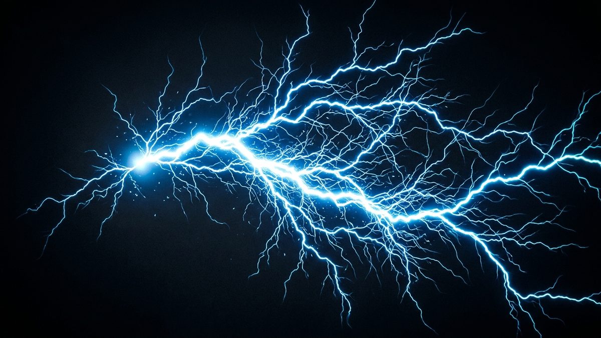 A bright blue-white electrical discharge branches like lightning from a glowing point on the left across a black background.